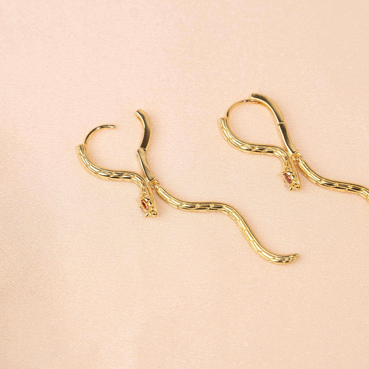 Pendientes Serpiente con Ojos Naranjas en Acero Inoxidable