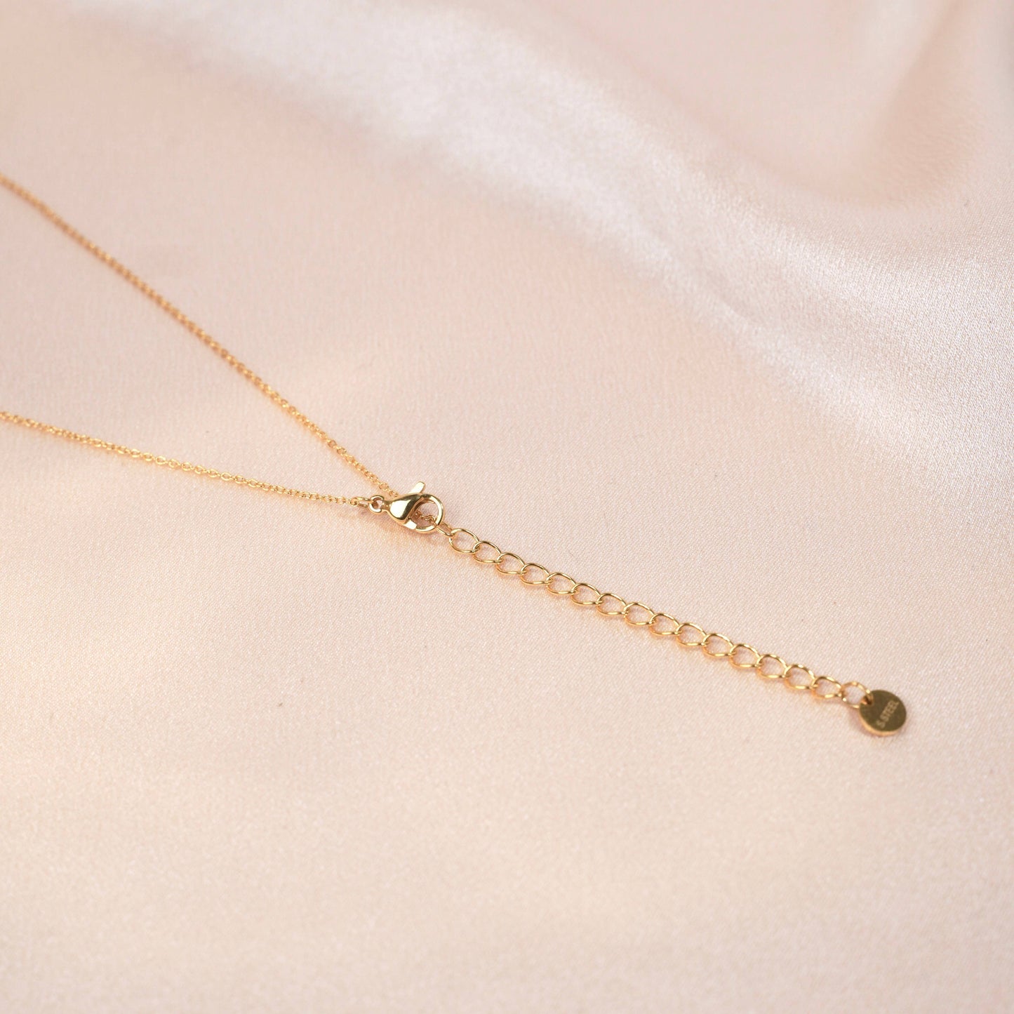 Collar largo y redondo con colgante