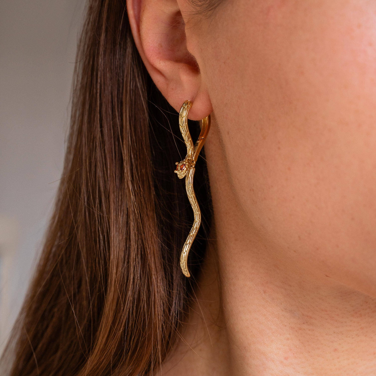 Pendientes Serpiente con Ojos Naranjas en Acero Inoxidable