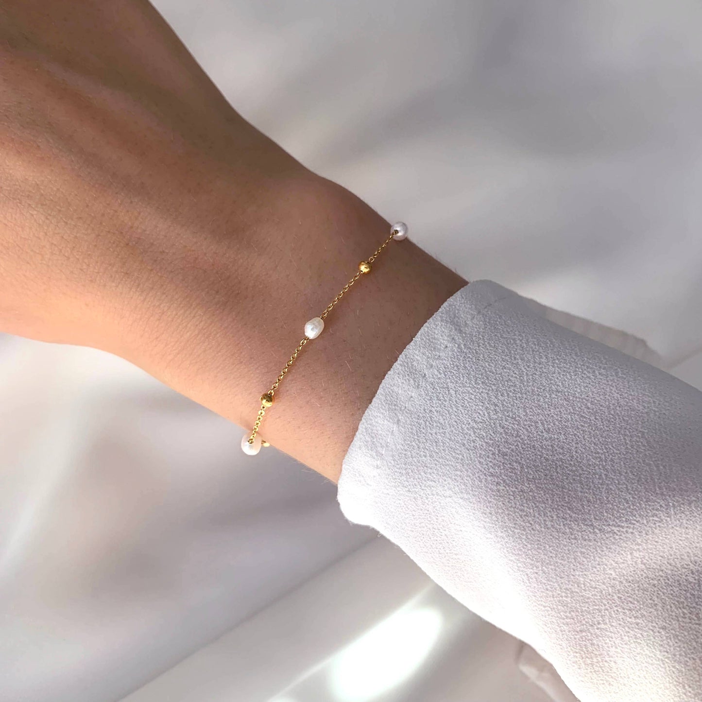 Pulsera fina de perlas de agua dulce