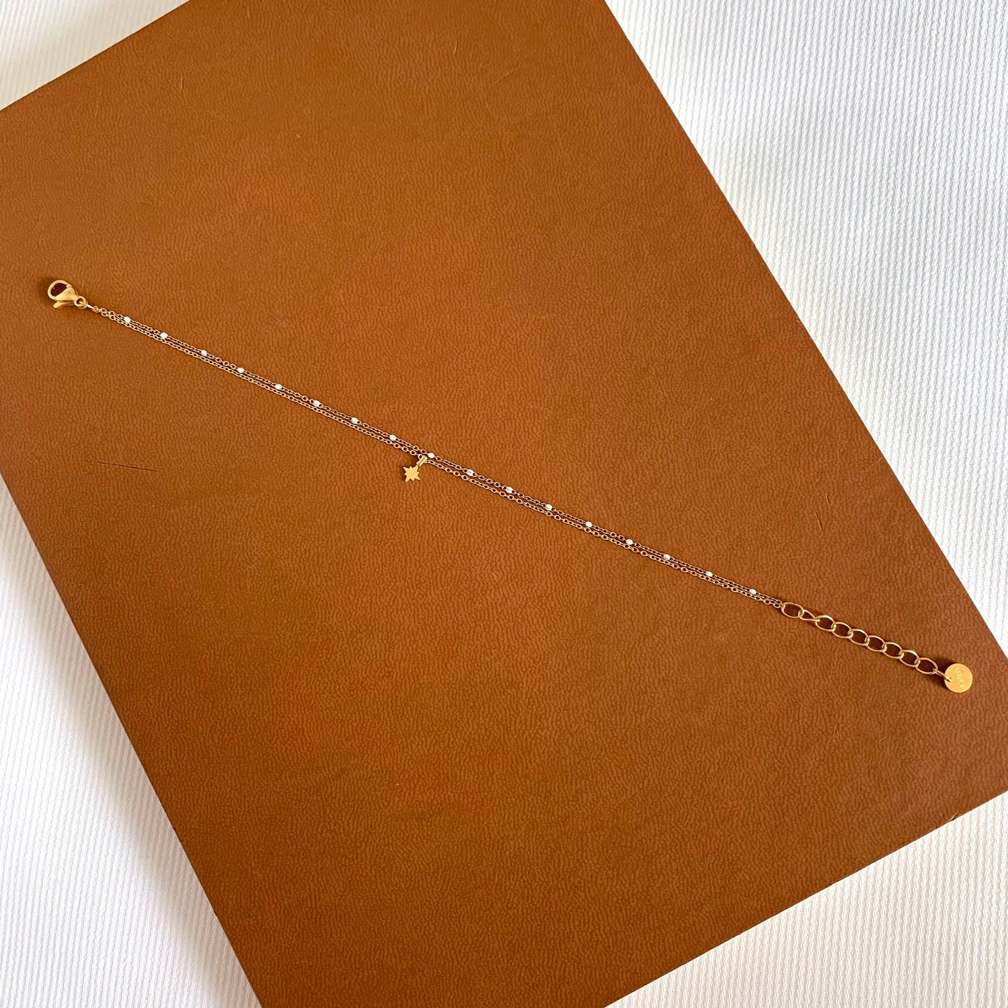 Pulsera con colgante de estrella de acero para mujer