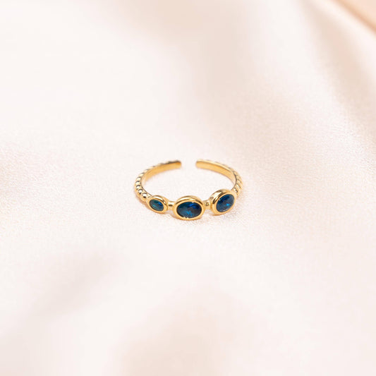 Anillo Ajustable Tres Circonitas Azules en Acero Inoxidable