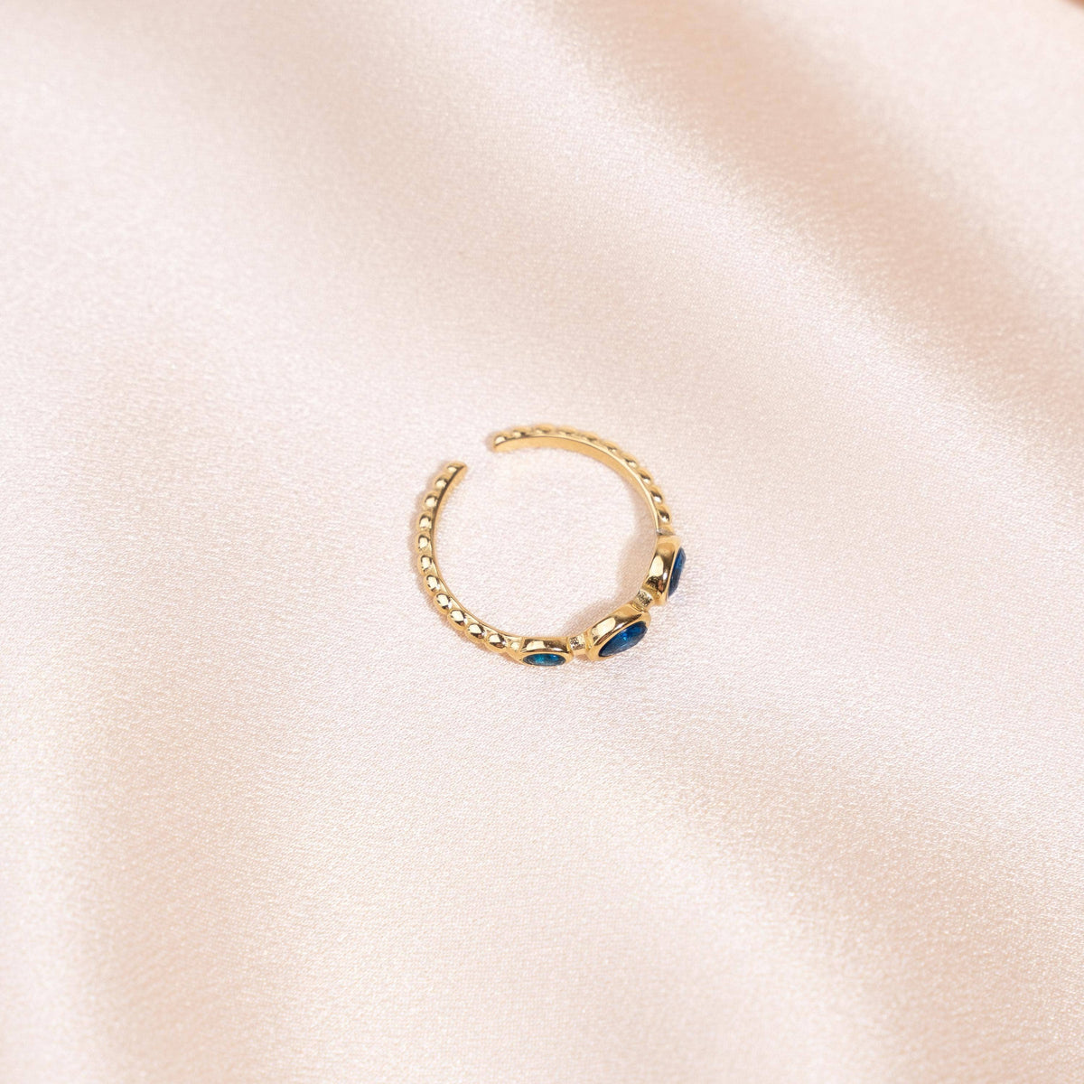 Anillo Ajustable Tres Circonitas Azules en Acero Inoxidable