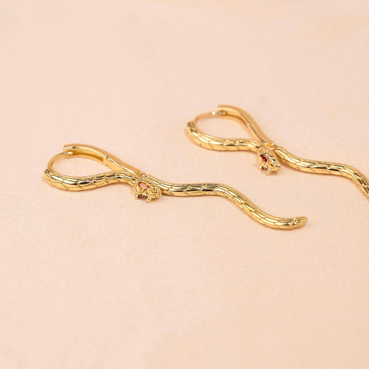 Pendientes Serpiente con Ojos Naranjas en Acero Inoxidable