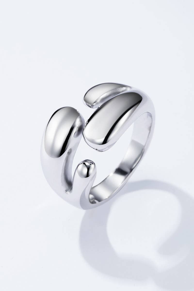 Anillo de acero inoxidable gotas entrelazadas