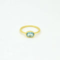 ANILLO OVALADO TOPACIO AZUL