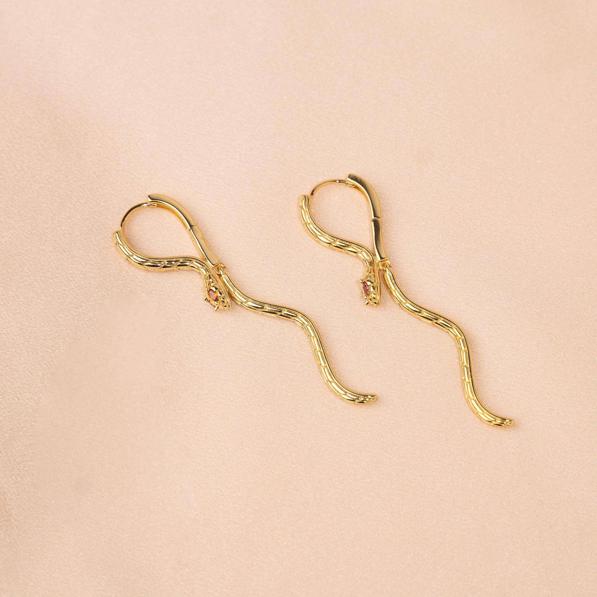 Pendientes Serpiente con Ojos Naranjas en Acero Inoxidable