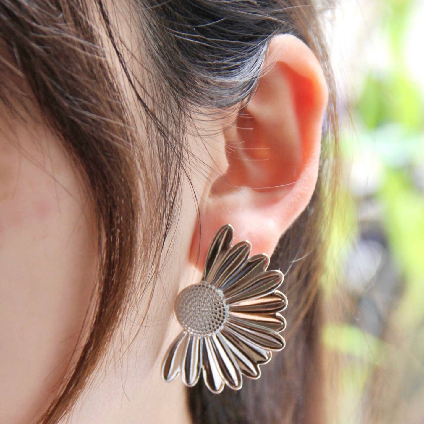 Pendientes Inna con forma de media flor de acero inoxidable