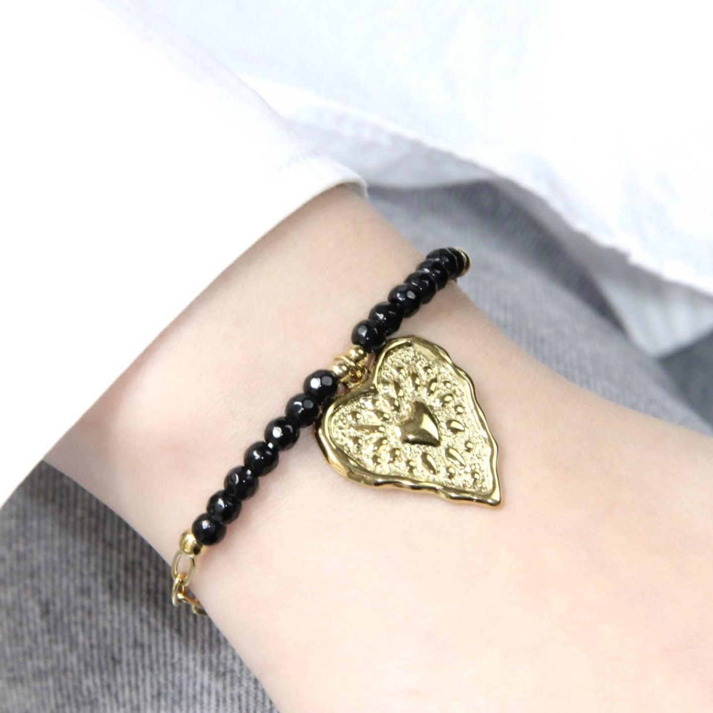 Brazalete Venus de acero inoxidable en forma de corazón y piedra