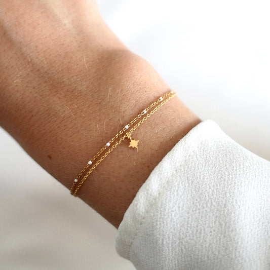 Pulsera con colgante de estrella de acero para mujer